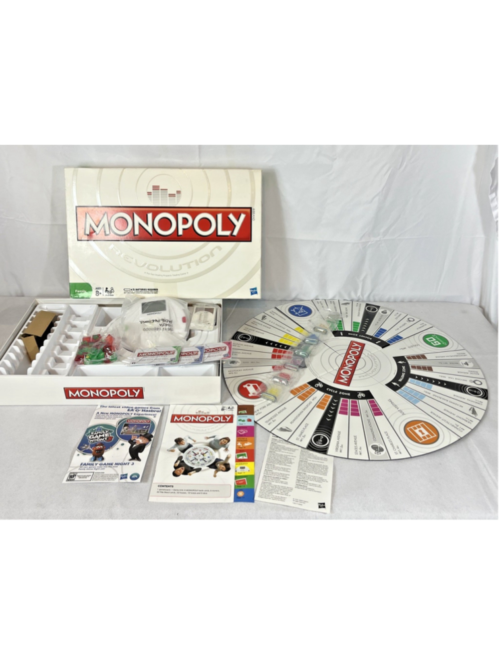 Monopoly Revolution Round Board Game Sounds & Music 2010 Hasbro New Open Box
